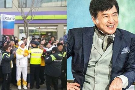 成龙传递冬奥圣火 众人围观气氛热烈