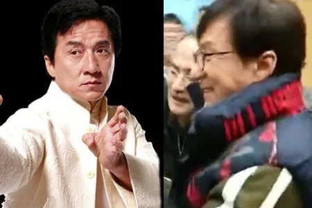 成龙传递冬奥圣火 众人围观气氛热烈