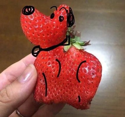 一颗特别像猫咪的草莓是什么梗