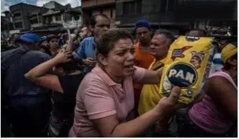 委内瑞拉为什么会发生哄抢事件?