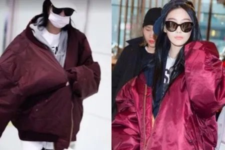 张馨予素颜逛菜场引来众人围观 身穿超大外衣出现机场